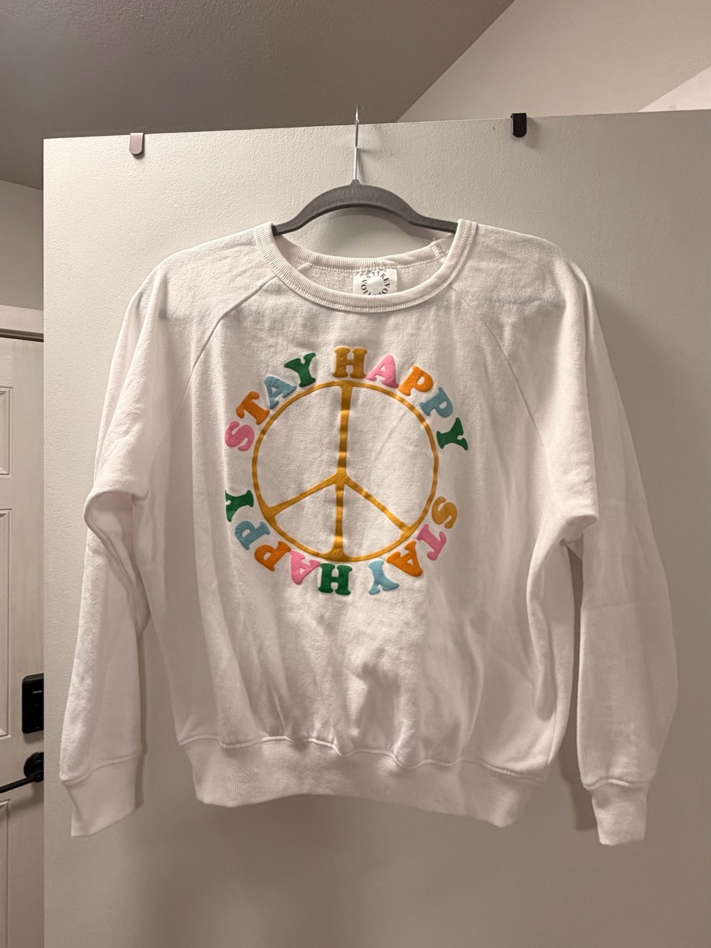 Revolution White Crewneck Sweatshirt with Multi-Color 'Stay Happy' Peace Sign